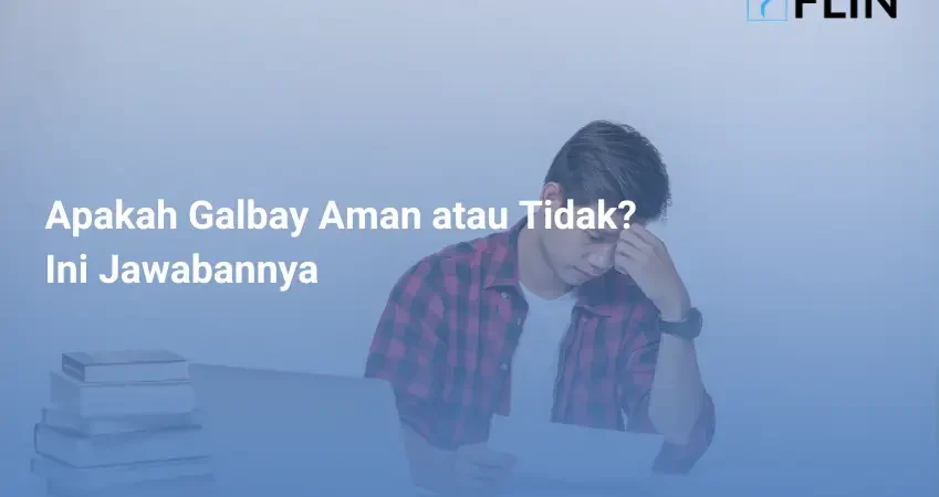 Seorang pria menggunakan laptop di kantor dan melakukan analisis dokumen