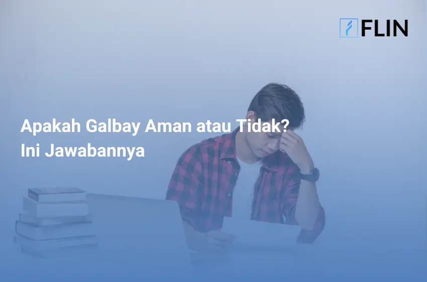 Seorang pria menggunakan laptop di kantor dan melakukan analisis dokumen