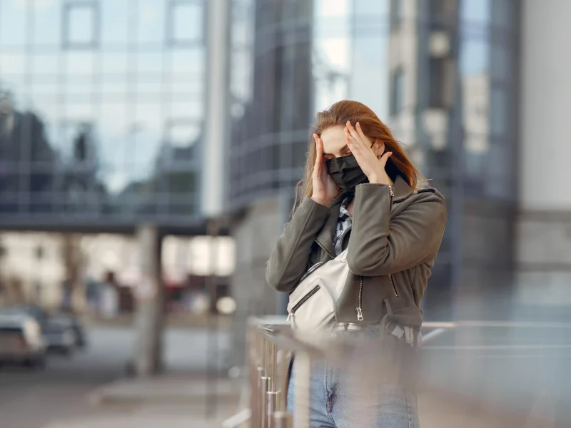 woman-mask-stands-street_3_11zon